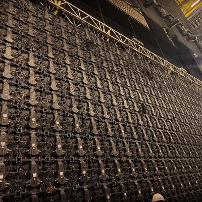The intricate backend of a massive LED screen being assembled by our technical team. This is the detailed work that powers the stunning visuals at our events.