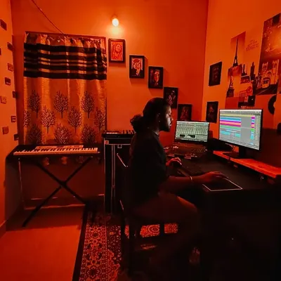 A typical late night session in my studio, surrounded by my gear. This is where I focus on sound design and arrangement to produce high quality house and techno tracks.