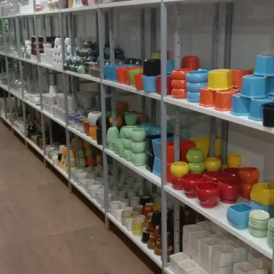 A view of our extensive collection of ceramic planters, available in a rainbow of colors and a variety of shapes and sizes to match any plant and decor.