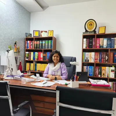 My office is designed to be a space for focused work and confidential client meetings. The shelves are filled with legal texts that support the diverse cases I handle, including family, criminal, and civil law.