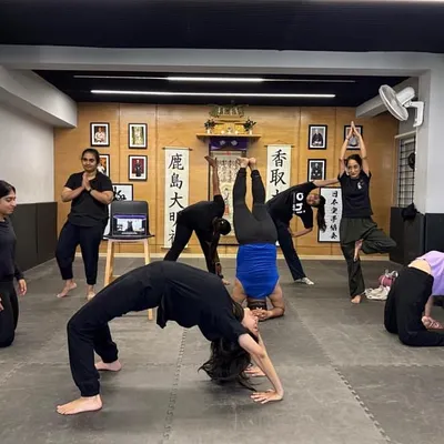 A snapshot from one of our flexibility sessions, where members work on advanced stretches. This focus on mobility is a core part of our training, ensuring the body remains pliable and strong through its full range of motion.