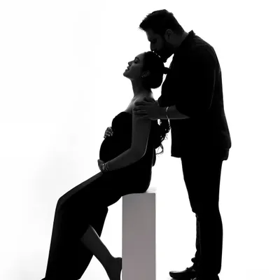 A powerful silhouette of a couple, showcasing the shape of their new beginning. This artistic style creates a timeless and emotional portrait.