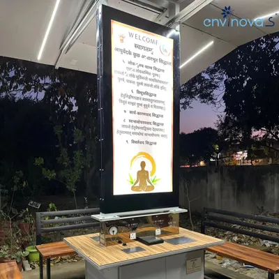 A close-up of our Smart Solar Hut at Shree Dhanwantry Ayurvedic College in Chandigarh. The digital screen displays a welcome message in Sanskrit, demonstrating how content can be customized to resonate with the specific environment and audience of the location.