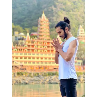 My practice is deeply rooted in the spiritual heritage of yoga, captured here in Rishikesh, the world's yoga capital. This connection to the source inspires my teaching and healing work. I believe that true wellness comes from aligning the body, mind, and spirit, a principle I bring to every session.