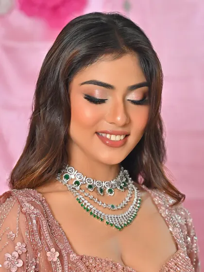 Another shot of this glowing soft glam makeup. The focus is on luminous skin and soft, shimmery eyes.