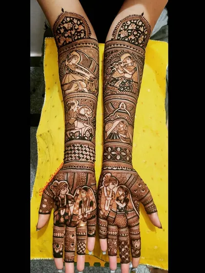 This artistic mehendi features multiple narrative panels, including Radha playing the flute, the bride in her doli, and the couple's portrait. It's a complex and captivating piece of storytelling.