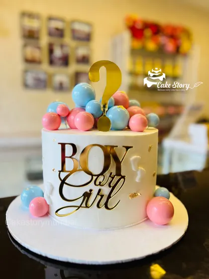 Another look at the elegant gender reveal cake, ready for the big surprise.