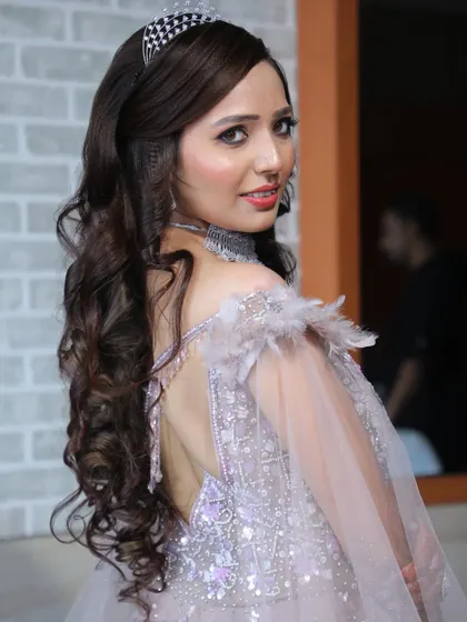 Our engagement bride Rhythm looks like a princess in her gown and tiara. The makeup is soft and romantic to match her fairytale look.