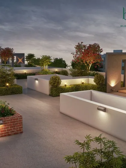 This 3D visualization shows a minimalist and modern terrace design at dusk. The focus is on clean lines, with built-in planter boxes, low hedges, and subtle wall-mounted lights that create a warm and inviting glow.