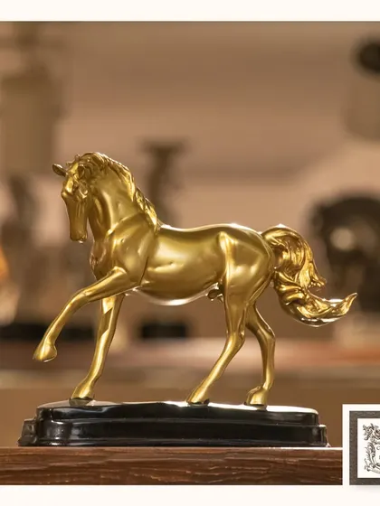 This artful horse figurine, finished in gold and black, is a beautiful decorative piece for a bookshelf or side table. It complements a variety of decor styles, from classic to contemporary.