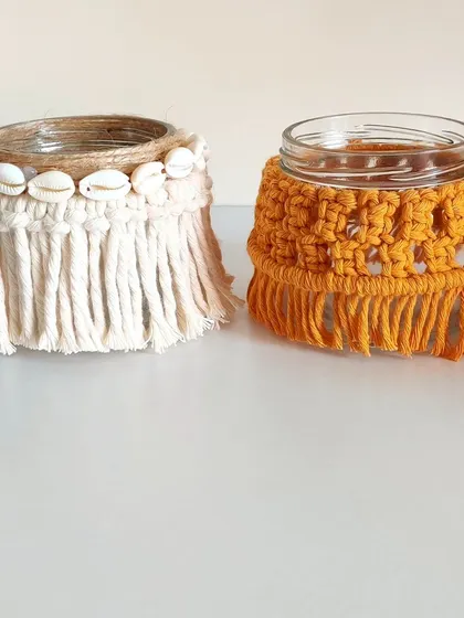 My macrame-covered jars are perfect for holding candles or small treats during the festive season. This set shows two different styles.