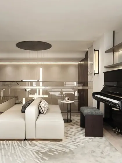 A second perspective of the minimalist living room, this view focuses on the integration of lifestyle elements like the piano and shelving. It shows how I plan spaces to be not just beautiful, but also personal and functional for the homeowner.