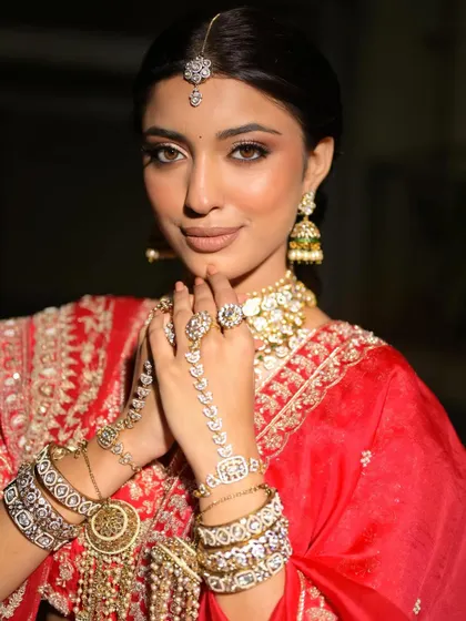 Another beautiful portrait showcasing the complete look. The makeup is designed to be timeless and photograph beautifully.
