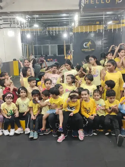 The kids' batch showing off their best poses during our yellow-themed class. Themed days add an extra layer of fun to our regular schedule.