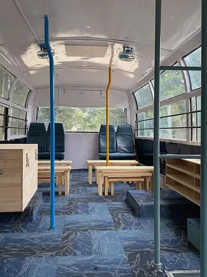The interior of the completed "Wonder on Wheels" bus. We helped design and execute this mobile classroom, which brings education to the children of daily laborers in Bangalore, transforming a standard bus into a bright and functional learning space.