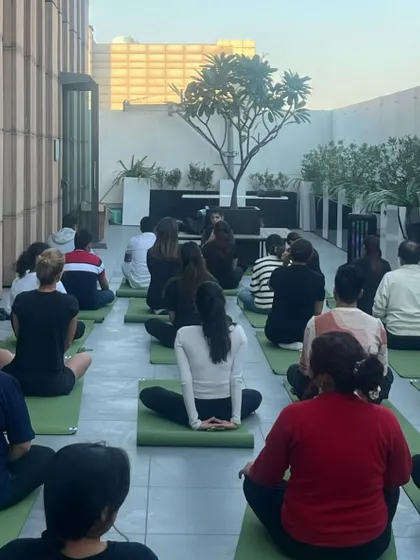 The Chanel team in a moment of quiet reflection. My corporate workshops are designed to provide a much-needed pause and tools for mental clarity in a high-pressure environment.