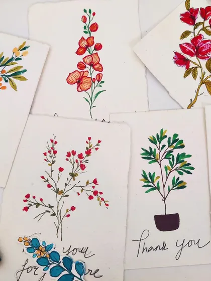 Handmade postcards are a beautiful old-school way to express your feelings. This collection features various floral illustrations, perfect for thank you notes or sending a message to someone special.