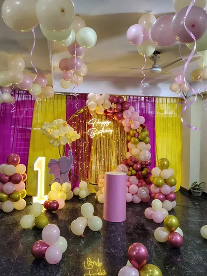 The full room view of the elephant-themed first birthday celebration.