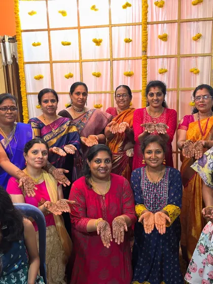 A large group photo from a mehendi party, showcasing the many happy guests we served in a single session.
