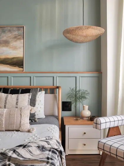 A sneak peek into the daughter's bedroom of Apartment 1101. The design fulfills her vision of a serene and neutral room with lots of whites and wooden flooring, creating a timeless and beautiful space.