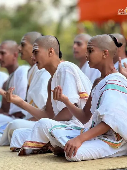 Young Vedic students chanting mantras during the morning Shiva Puja on Maha Shivratri. Their training in ancient traditions ensures these rituals are preserved and performed with authenticity.