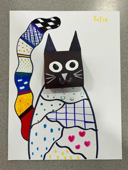 My 6-year-olds tried out some pattern art to create these quirky cats with 3D faces.