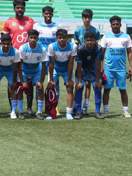 Our senior team, focused and ready for kickoff at the Bangalore Football Stadium.