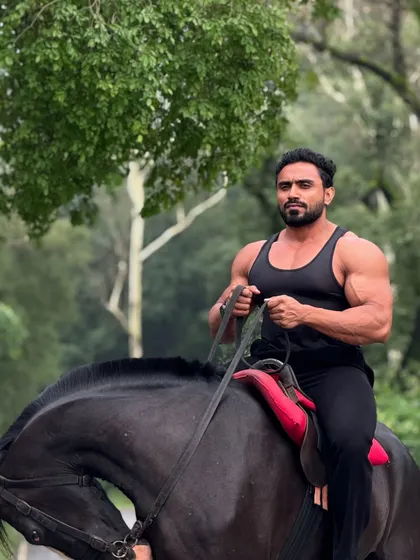 A confident pose on the horse.