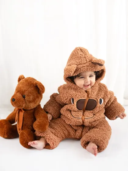 Can it get any cuter? This little one is dressed as a teddy bear for his seven-month milestone shoot. I adore creating these playful, themed sessions that capture the pure joy of being a baby.