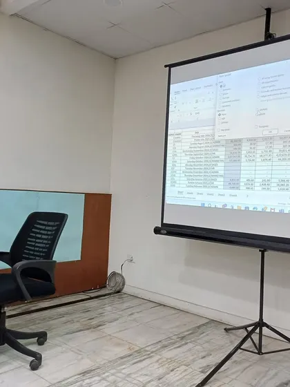 Projecting Success: Using Visuals in Technical Training. During our Advanced Excel workshop, we use projectors to demonstrate complex functions and formulas live. This ensures everyone can follow along and understand the practical application of each skill.