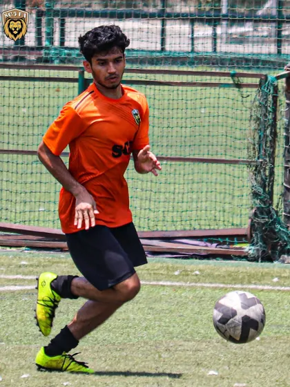 An action shot from our 2-2 draw with Springfield FC in the MFA First Division, showing a player on the dribble.