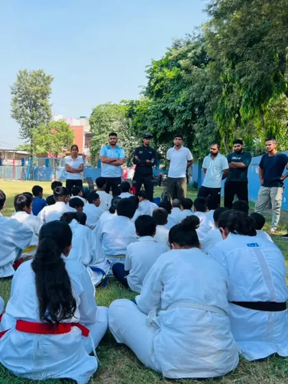 Coaches addressing the students during the seminar. We focus on both physical and mental training.