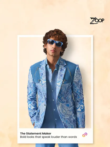For the man who wants his presence felt, we designed this statement blazer. The bold blue paisley print, combined with structured shoulders and a modern cut, creates a look that speaks volumes. It’s a fusion of traditional motifs and contemporary fashion, perfect for making an entrance.