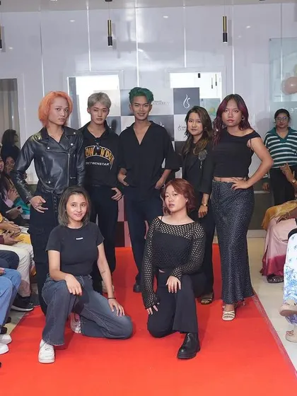 Models on the runway at our launch event, showcasing edgy hair and makeup looks created by our talented students and educators.