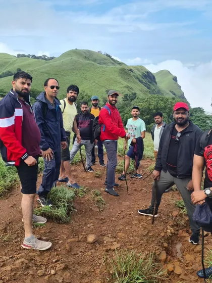 A group of trekkers taking a break on the trail to Ballarayanadurga Fort as part of the Bandaje trek.