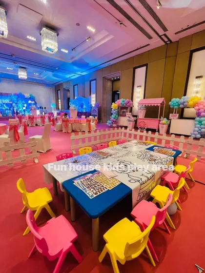 A fun and practical setup with our colorful chairs and tables ready for activities. The tables are covered with coloring sheets and stickers, providing built-in entertainment for the kids.