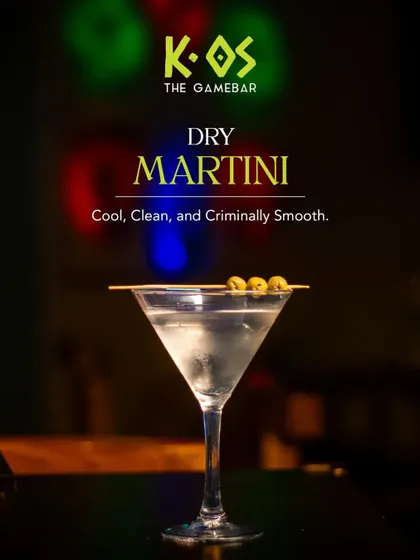 Cool, clean, and criminally smooth. A classic Dry Martini, garnished with olives, is always a good choice.