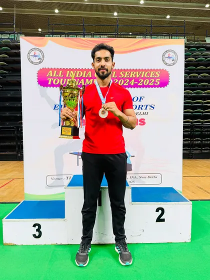 Our coach Akash Gupta on the podium after securing the runner-up position in the Men’s Singles at the All India Civil Services Table Tennis Tournament 2024-25.