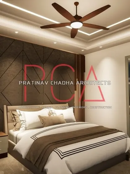 A visualization of another bedroom in the Vasant Kunj project, with a dark, textured feature wall and a large sliding glass door leading to a balcony.