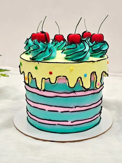 This comic book or cartoon-style cake is a fun and popular trend we cover. I teach you how to use black icing to create bold outlines that make the cake look like a 2D drawing.