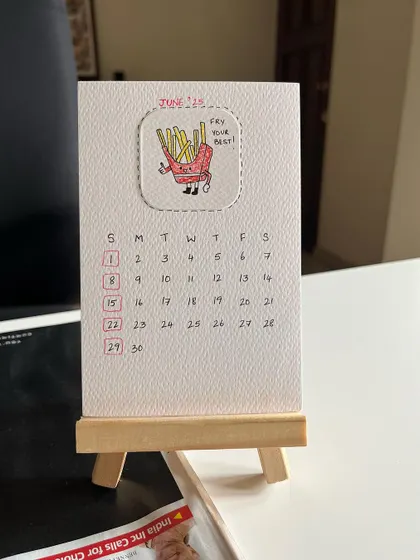 A cheerful box of fries for June, encouraging you to "Fry your best!".