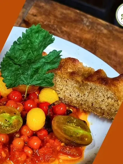 A beautifully plated dish from our 'Celebrating Mulberries' dinner. This dish features a tomato and bread salad using heirloom tomatoes and fresh greens from the farm.