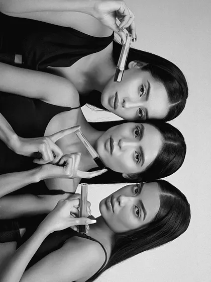 A black and white version of the group beauty shot, adding an artistic and high-fashion feel to the campaign.