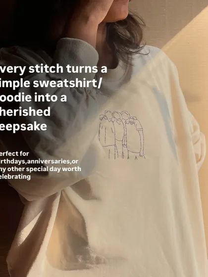 Every stitch turns a simple sweatshirt into a cherished keepsake. This image perfectly captures how a photo can become wearable art.