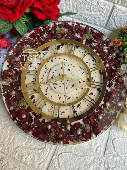 Another look at the wedding garland clock, showing how the preserved petals and pearls are perfectly suspended in the clear resin.