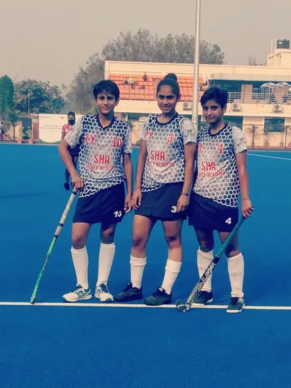 Three of my key players from the U-16 team on the AstroTurf. Their strong stance and readiness show the fire within that we nurture in every athlete.