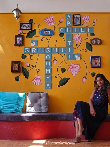 Another shot of me with the completed Scrabble and Pichwai mural, a truly one-of-a-kind piece that reflects the family's story.