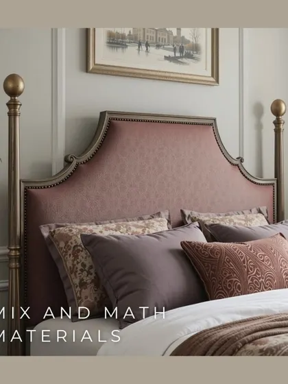 Mixing and matching materials on a headboard, like this combination of a dusty rose fabric and a wooden frame with nailhead trim, adds texture, depth, and a touch of classic elegance to the bedroom.