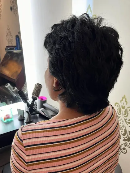 The back view of the pixie, showing how it's tapered to suit thick hair.