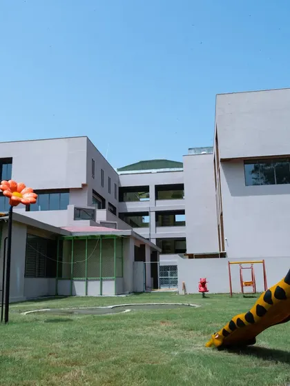 We also integrate playful sculptures, like this giraffe slide, into the outdoor play areas. These elements merge art with function, making the playground a more imaginative and exciting space for children.